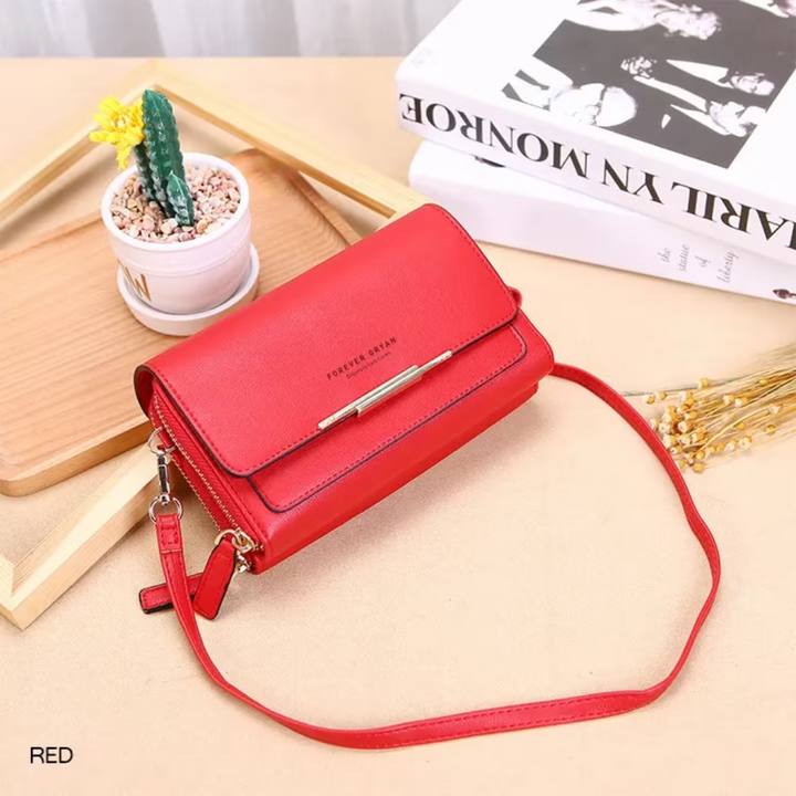Chic women's faux leather shoulder bag, versatile as a crossbody with its own wallet.