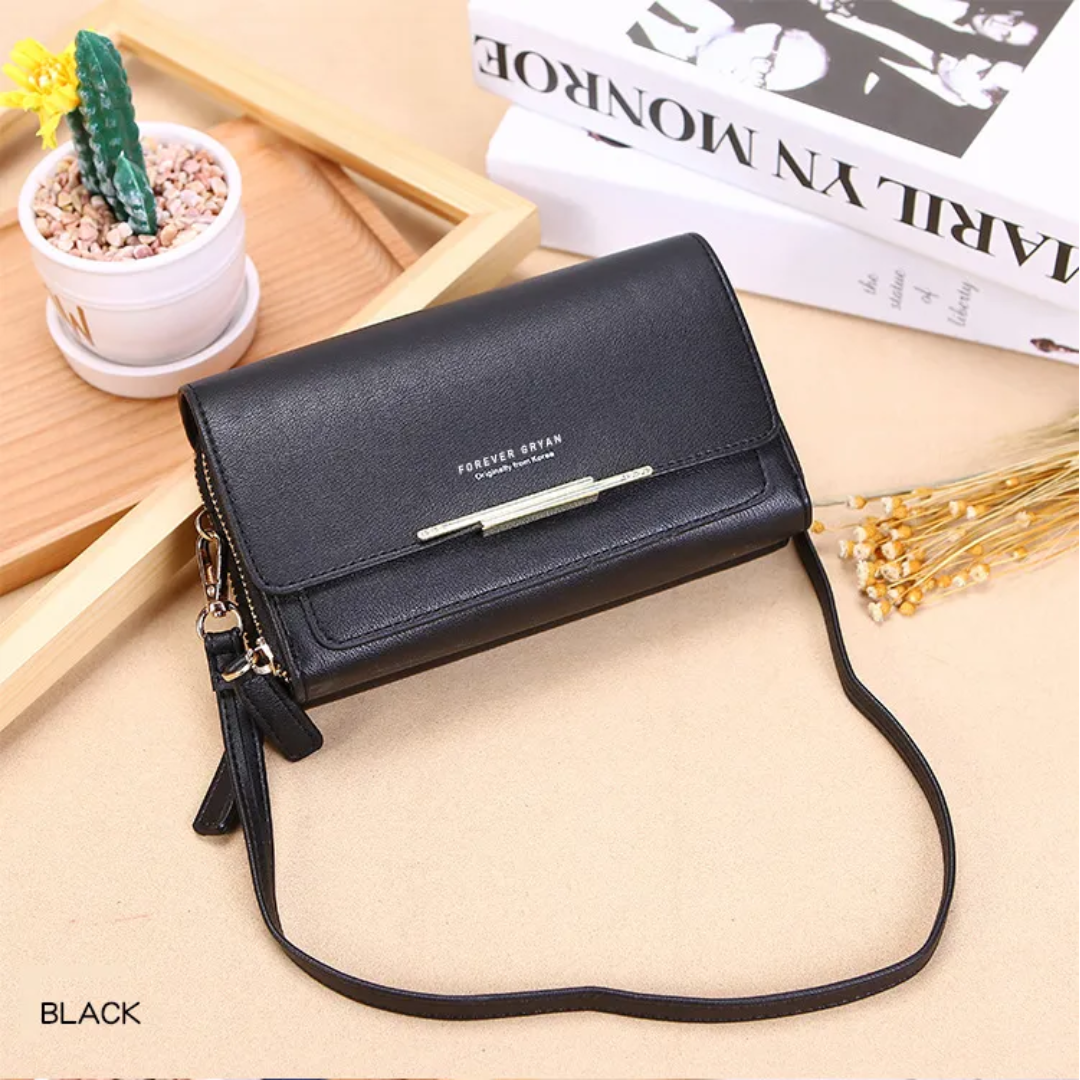Stylish women's faux leather organizational bag, a compact crossbody with an integrated wallet.