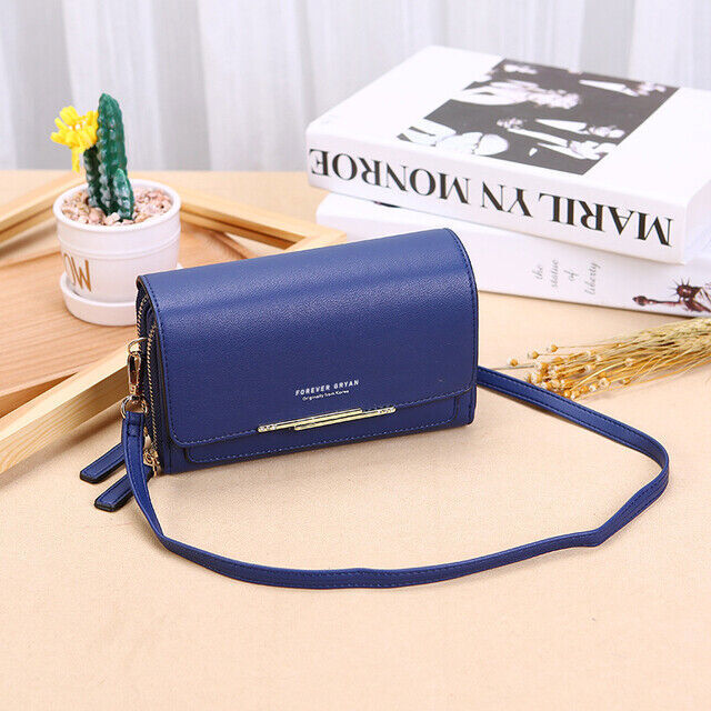 Modern women's faux leather crossbody bag with a sleek design and included wallet.
