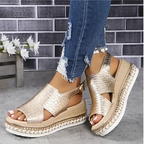 Women's stylish gold platform sandals with adjustable straps, perfect for summer comfort & chic vacation wear.