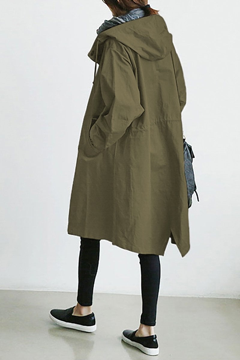 Back view of women's long hooded waterproof rain trench coat. Ideal lightweight travel outerwear jacket.