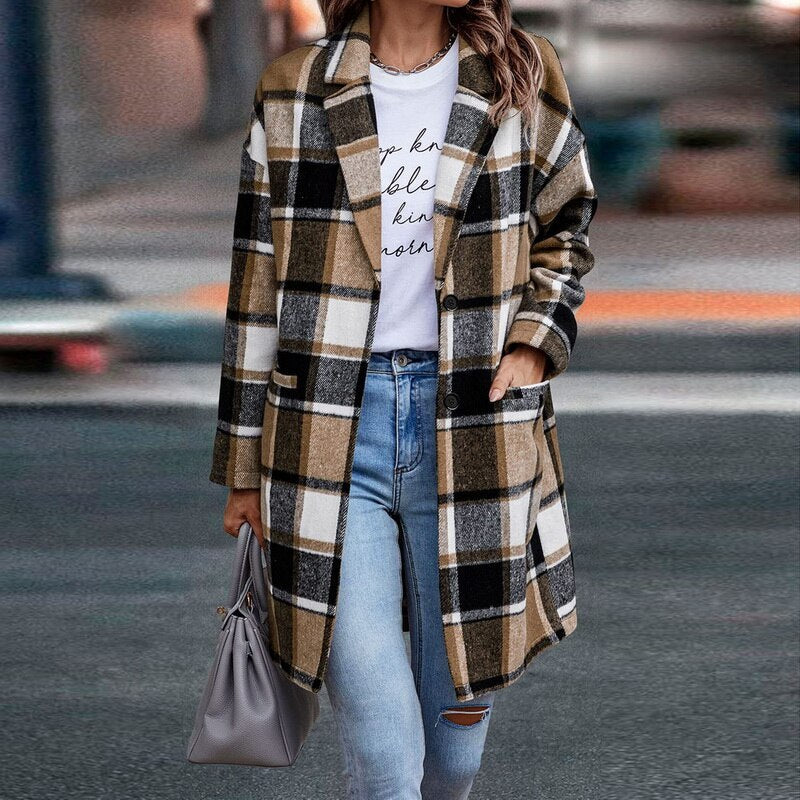 Fashionable women's plaid jacket, a chic and warm layering piece for autumn and cool weather trends.
