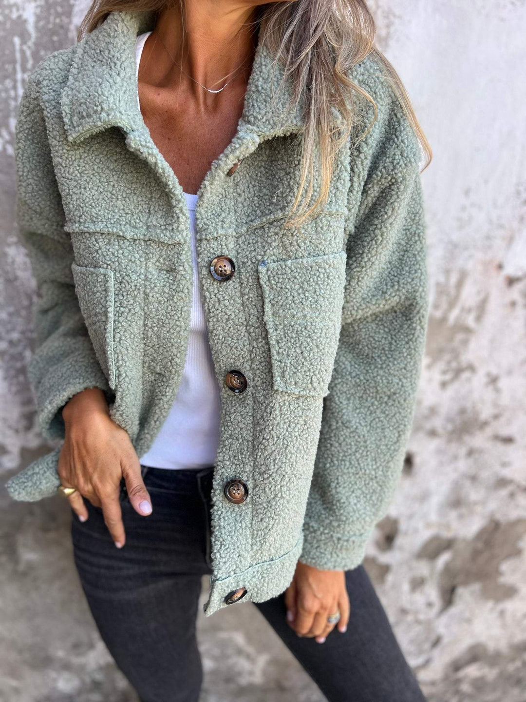 Women's stylish thick knit cardigan jacket. Cozy long sleeve button front coat for autumn layering.