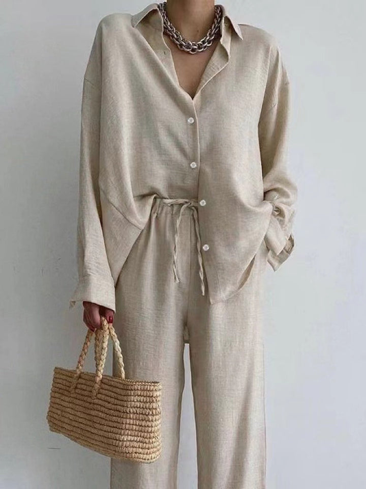 Women's stylish two-piece set: relaxed fit blouse & wide-leg drawstring pants. Perfect casual chic summer outfit.