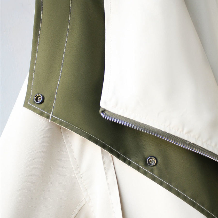 Trendy women's waterproof rain jacket, perfect lightweight outerwear for stylish everyday wear.