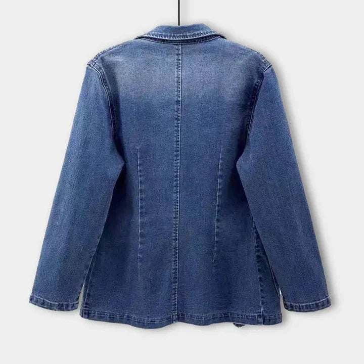 Chic women's blue tailored blazer. Ideal layering piece for spring and autumn outfits, adding a structured classic style.