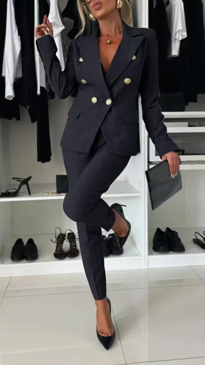 Women's tailored workwear blazer & trouser set. Professional business attire for office and formal events.