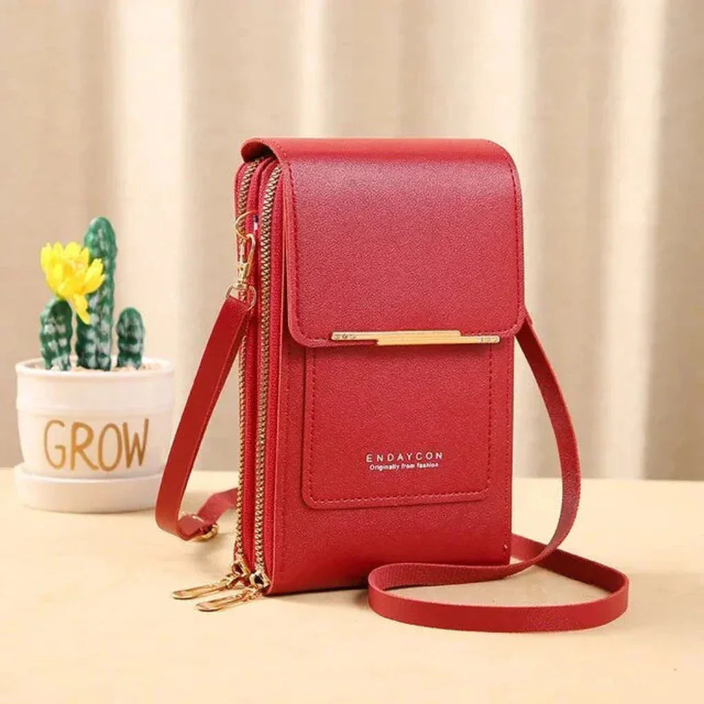 Organized women's travel bag featuring a clear touch screen panel for smartphone access & essentials.