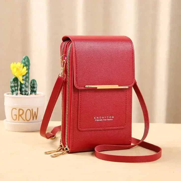Organized women's travel bag featuring a clear touch screen panel for smartphone access & essentials.