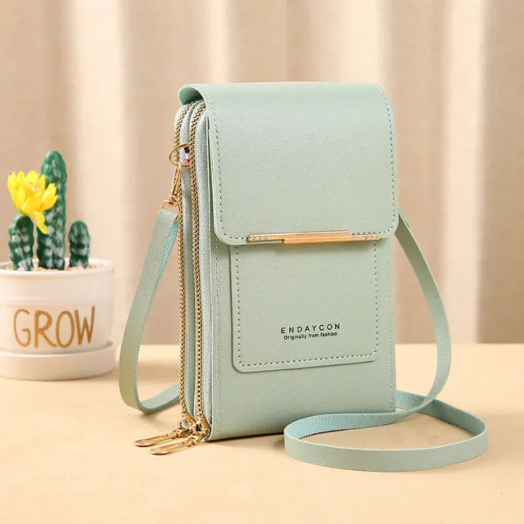 Modern women's touch screen travel purse, a stylish shoulder bag for organized daily essentials & secure phone use.