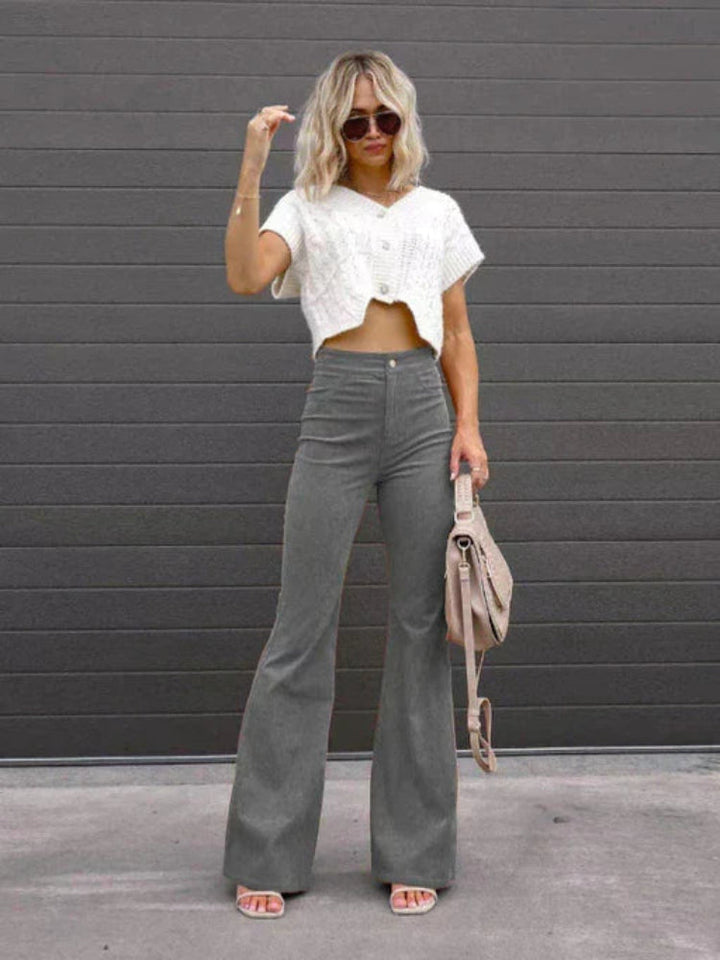 Elegant women's flare pants with a high waist and trendy flared leg, perfect for casual chic and fashionable styling.