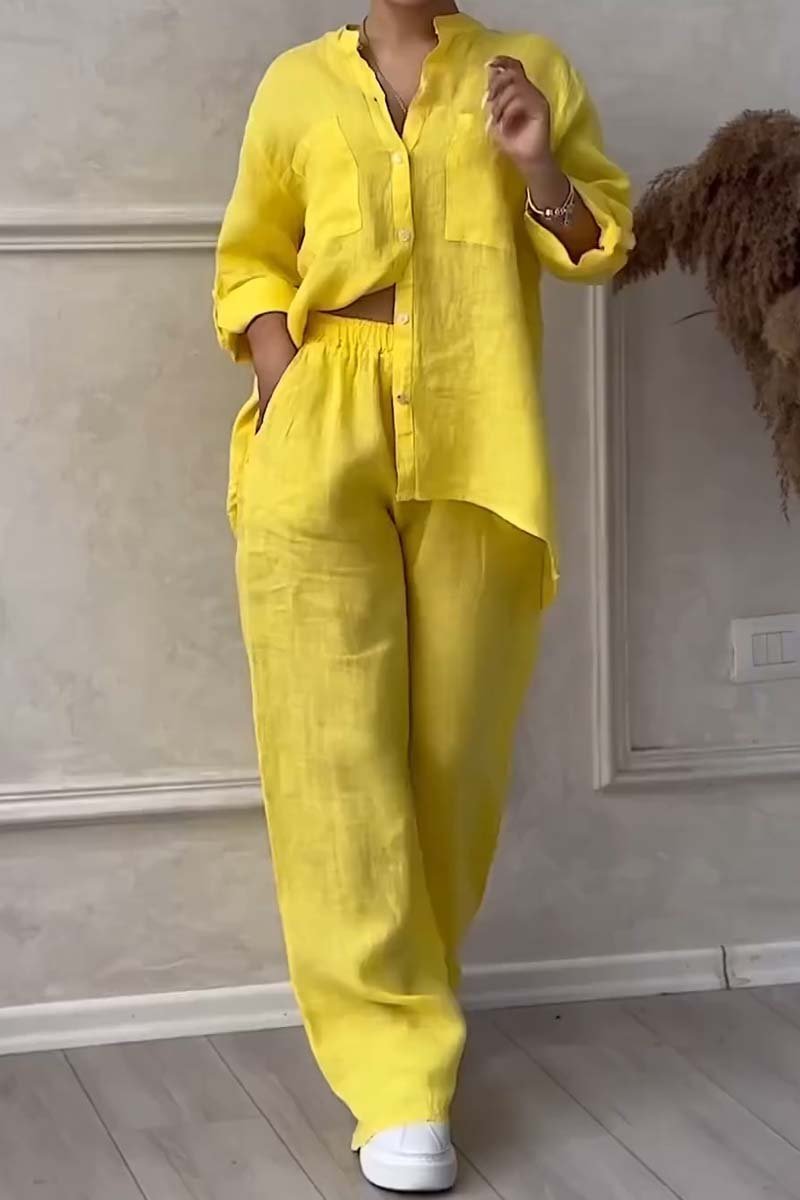 Stylish women's linen two-piece set with blouse & wide-leg trousers, ideal for summer vacation or resort wear.