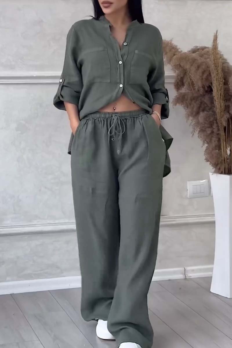 Trendy women's linen two-piece set with a modern blouse & wide-leg trousers, a stylish matching outfit.