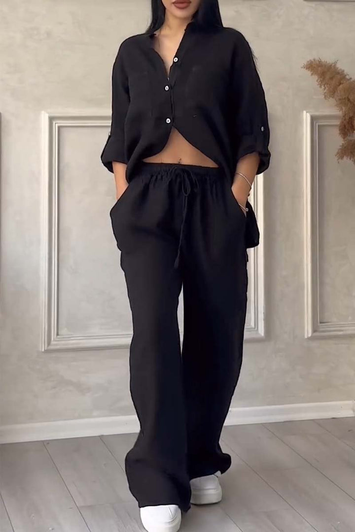 Versatile women's linen two-piece set: elegant blouse & wide-leg trousers for casual or vacation style.