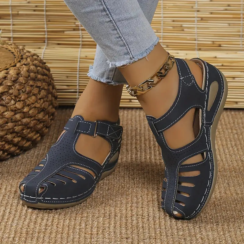 Stylish women's wedge heel sandals with orthopedic support, perfect for summer comfort.