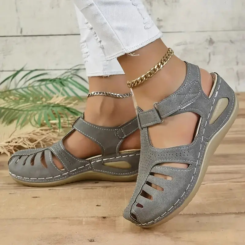 Trendy open-toe women's sandals, offering orthopedic arch support & comfort footwear for summer.