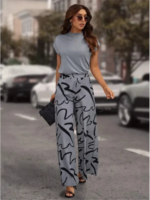 Comfortable & stylish women's printed wide leg pants. Perfect patterned trousers for a chic spring/summer outfit.