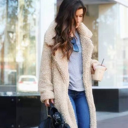 Women's trendy warm long teddy coat for winter, perfect for cozy and stylish outerwear.
