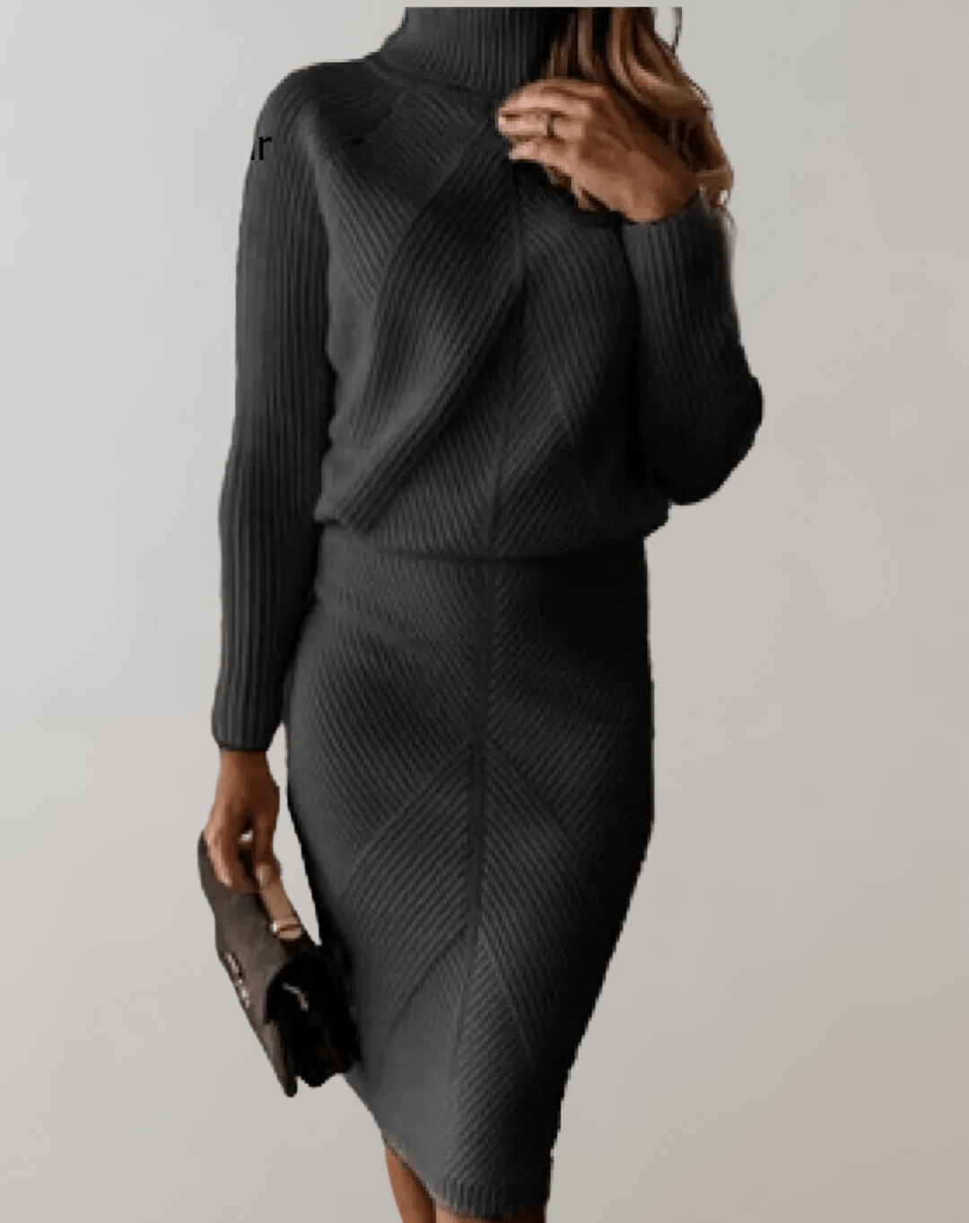 Soft knit women's turtleneck sweater & midi skirt set with chic chevron pattern.