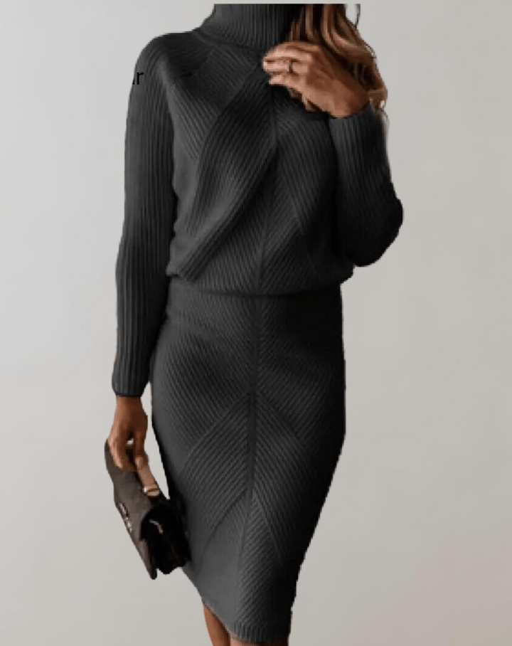 Soft knit women's turtleneck sweater & midi skirt set with chic chevron pattern.