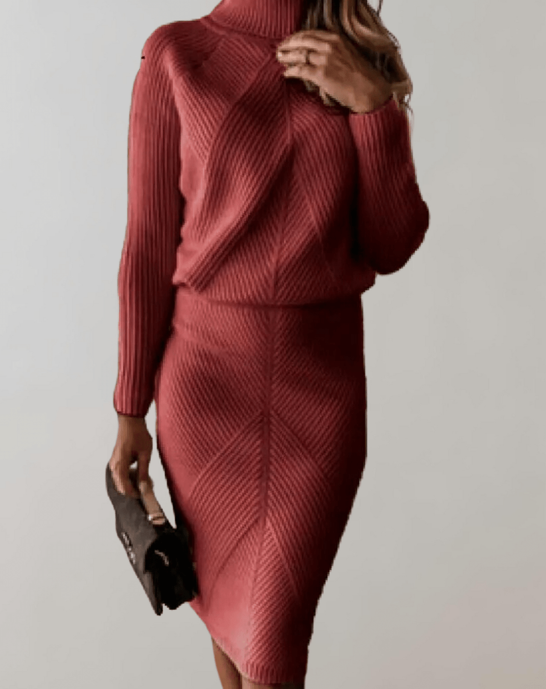 Cozy women's matching set with turtleneck sweater & midi skirt. Chevron pattern for winter fashion.