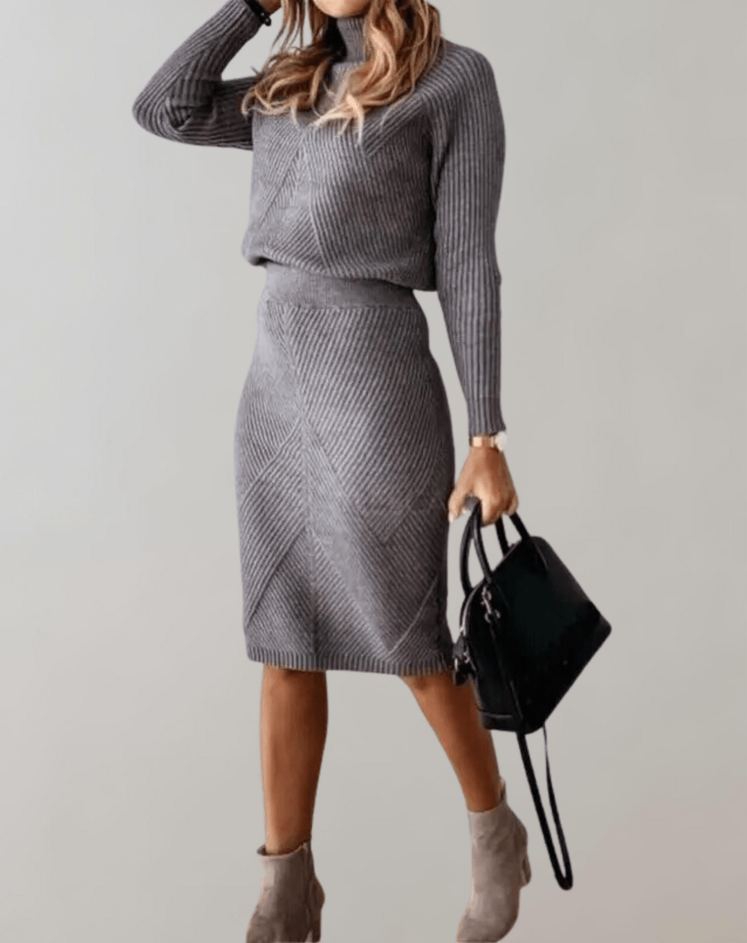 Complete women's winter look: turtleneck sweater & slim midi skirt matching set. Elegant chevron.