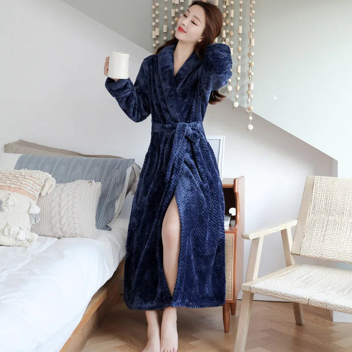 Close-up of the plush texture of a women's soft bathrobe, highlighting its cozy and luxurious feel.
