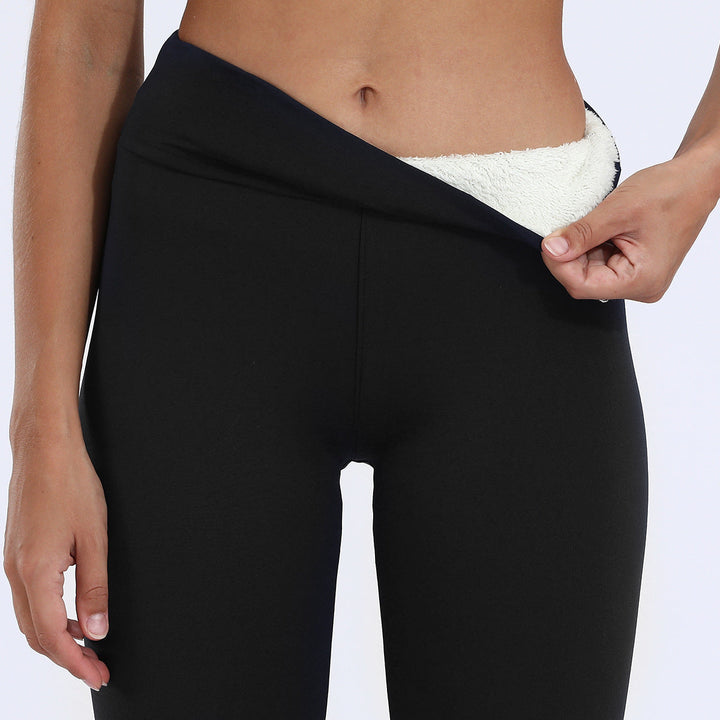 Full-length shot of women's warm thermal leggings, ideal for cold weather, activewear, or daily wear.