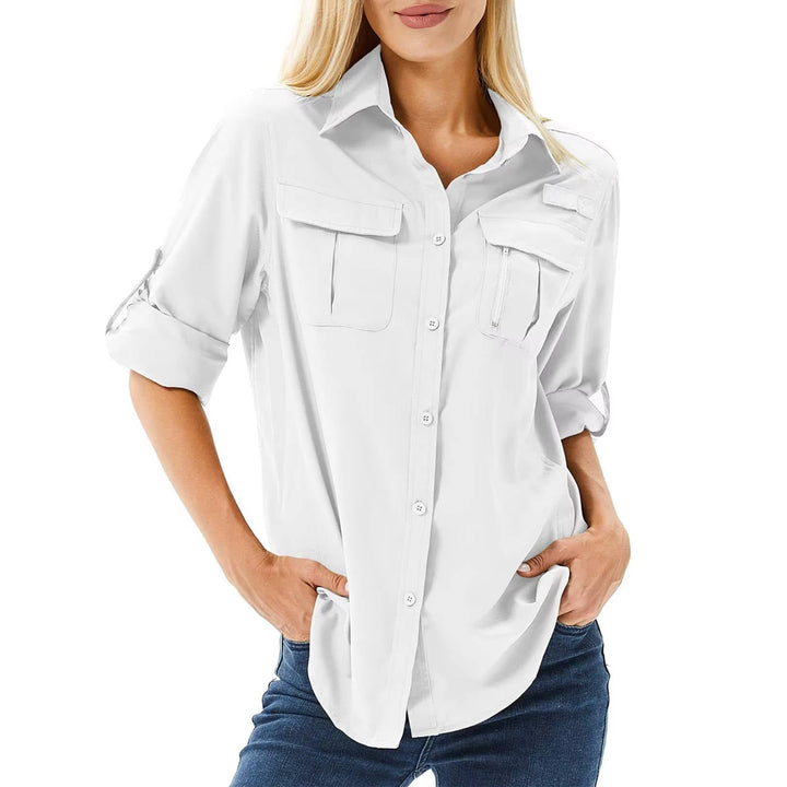 Close-up of women's UPF 50 long sleeve hiking shirt fabric, showing breathable texture for active wear.