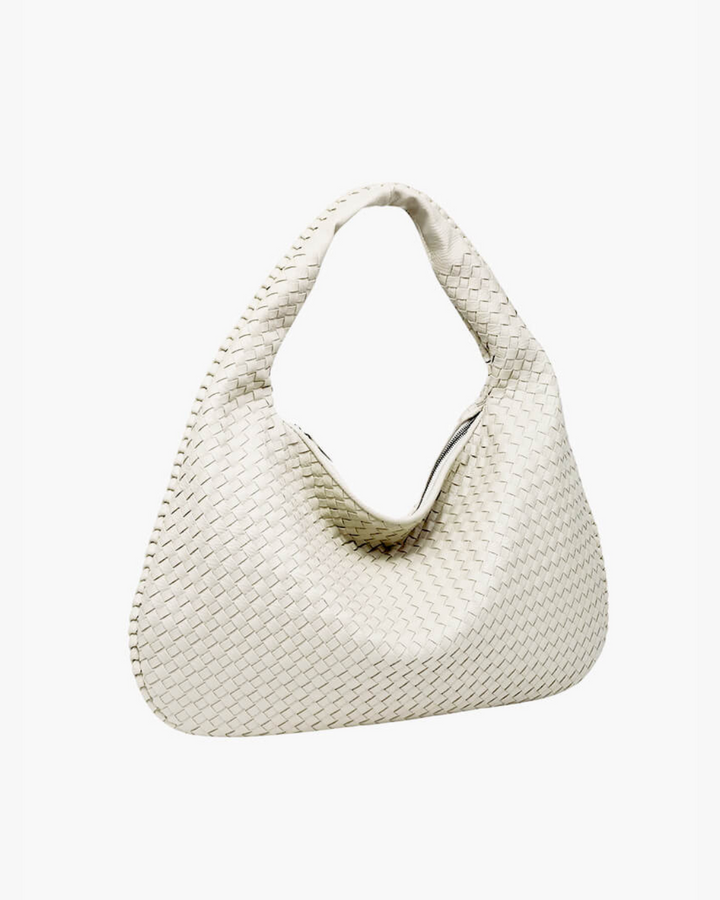 Side profile of the Verona women's woven hobo bag, a chic textured carryall for daily use.