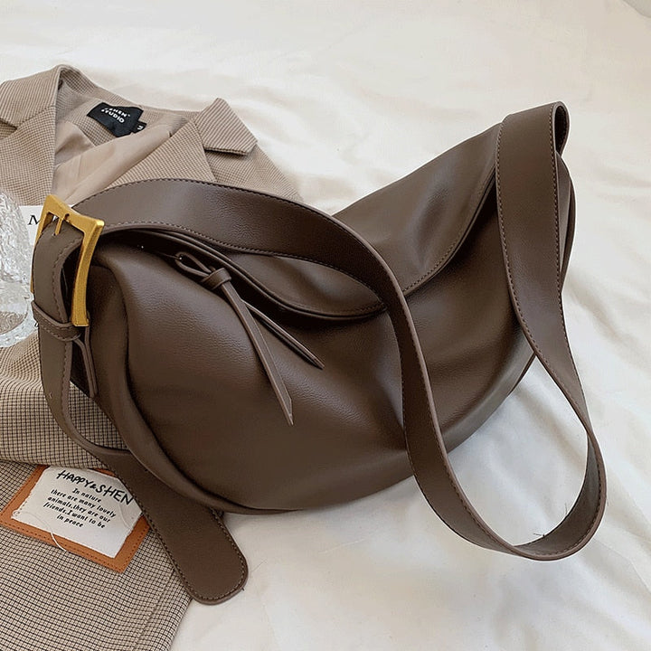 Elegant women's crossbody purse with an adjustable strap, ideal for daily essentials and a chic, hands-free look.