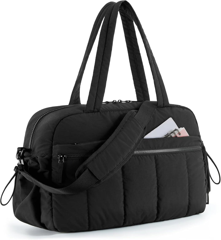 Beige women's duffle bag. Spacious travel, gym, or work carryall with a convenient outer pocket. Durable shoulder bag.