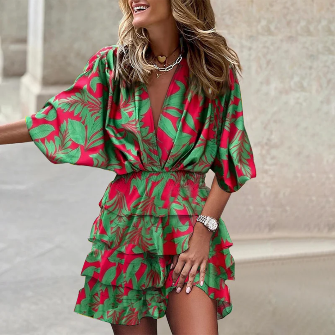 Modern women's vibrant mini dress. Colorful design, comfortable fit for sunny summer days & party outfits.