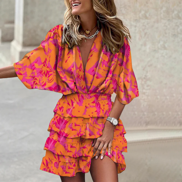 Comfortable women's vibrant mini dress by Sophie. A colorful, modern summer dress for daily wear or parties.