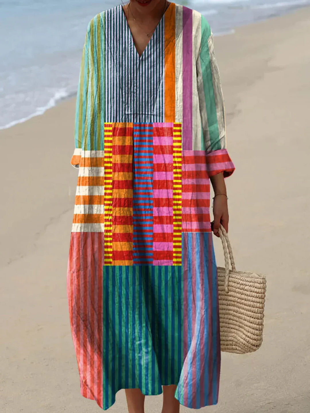 Women's vibrant multicolor flowy maxi dress, perfect for summer, beach, or casual elegant wear. Chic and comfortable.