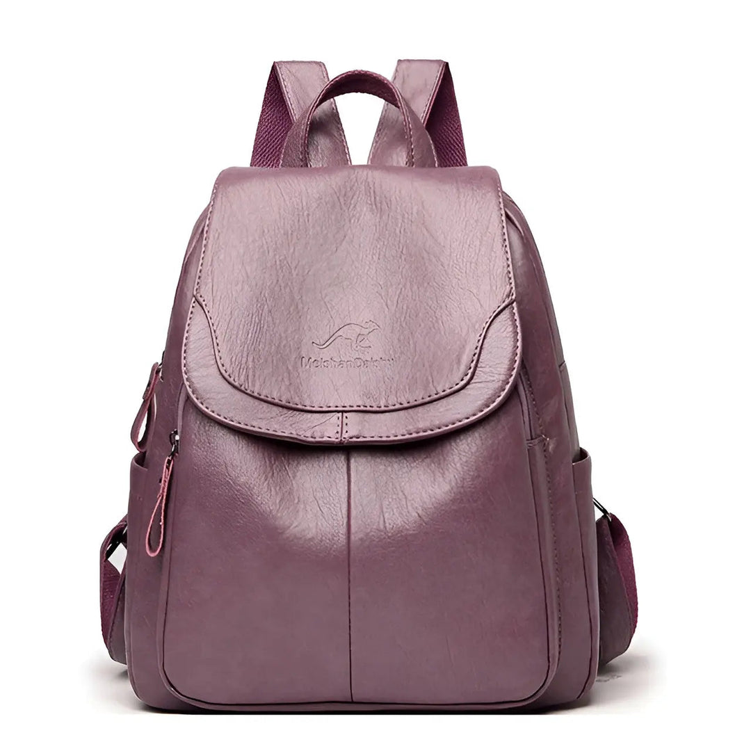 Elegant brown vintage leather women's backpack, secure anti-theft design for travel & work.