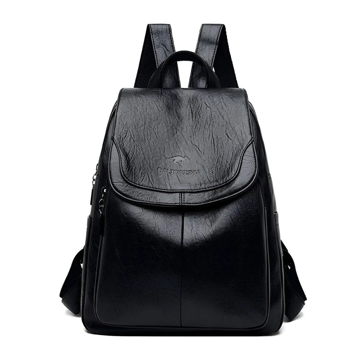 Secure anti-theft zipper on a women's vintage leather shoulder backpack, stylish and functional.