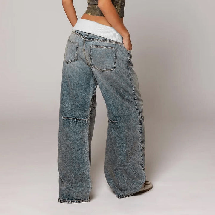 Baggy women's relaxed fit wide leg denim jeans. Comfortable vintage style for everyday casual wear.
