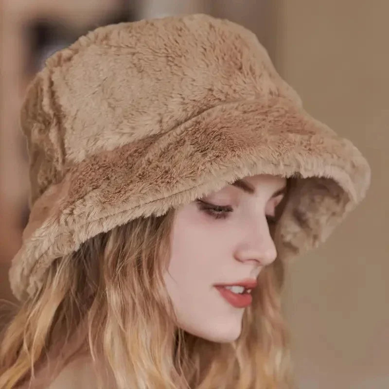 Women's warm faux fur bucket hat. Plush and cozy for autumn & winter fashion.