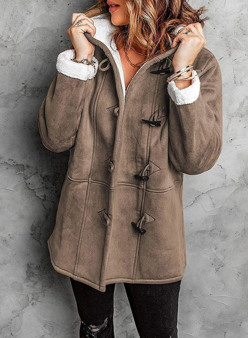 Women's stylish hooded winter coat, providing ultimate warmth and protection from harsh cold weather.