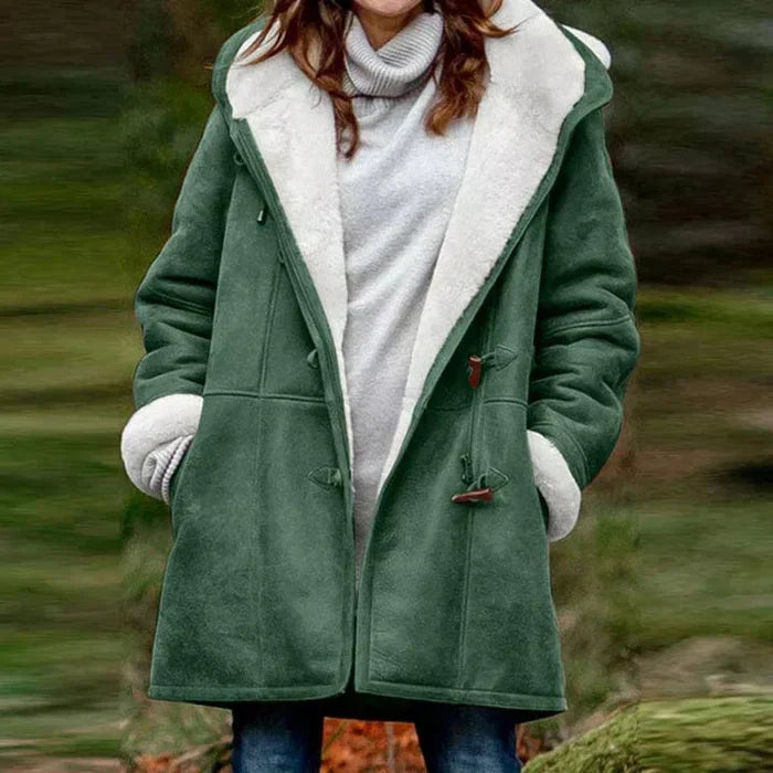 Fashionable women's hooded winter coat designed for warmth and style in cold weather conditions.