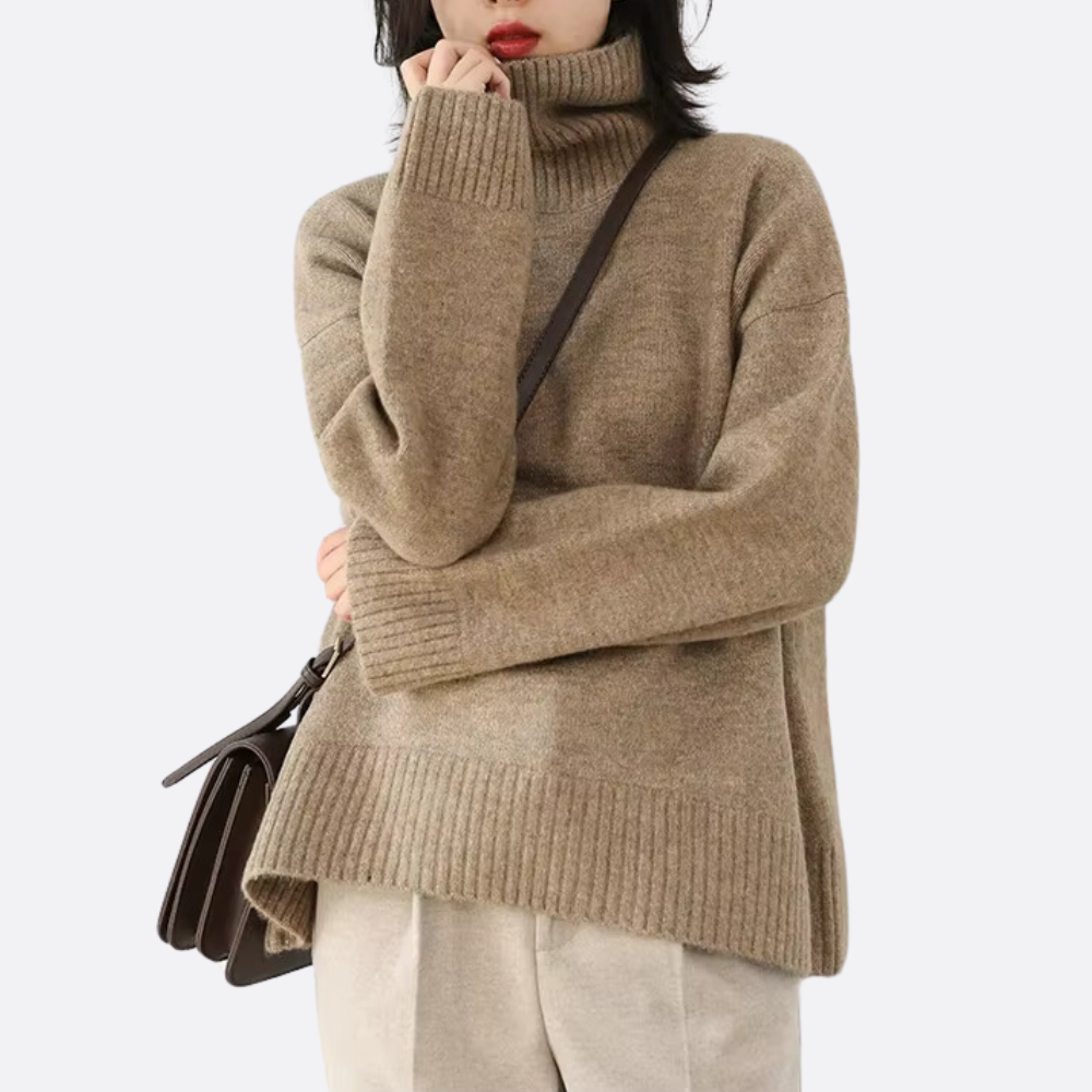 Warm women's oversized turtleneck sweater, long sleeve knit with a relaxed fit for ultimate winter coziness.
