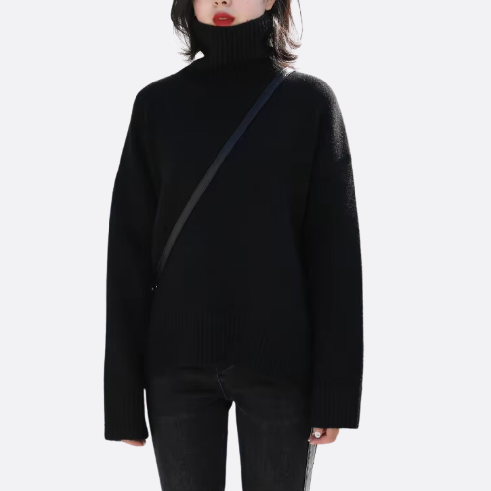 Comfortable women's oversized turtleneck sweater, a chic and warm long sleeve top for everyday fall & winter style.