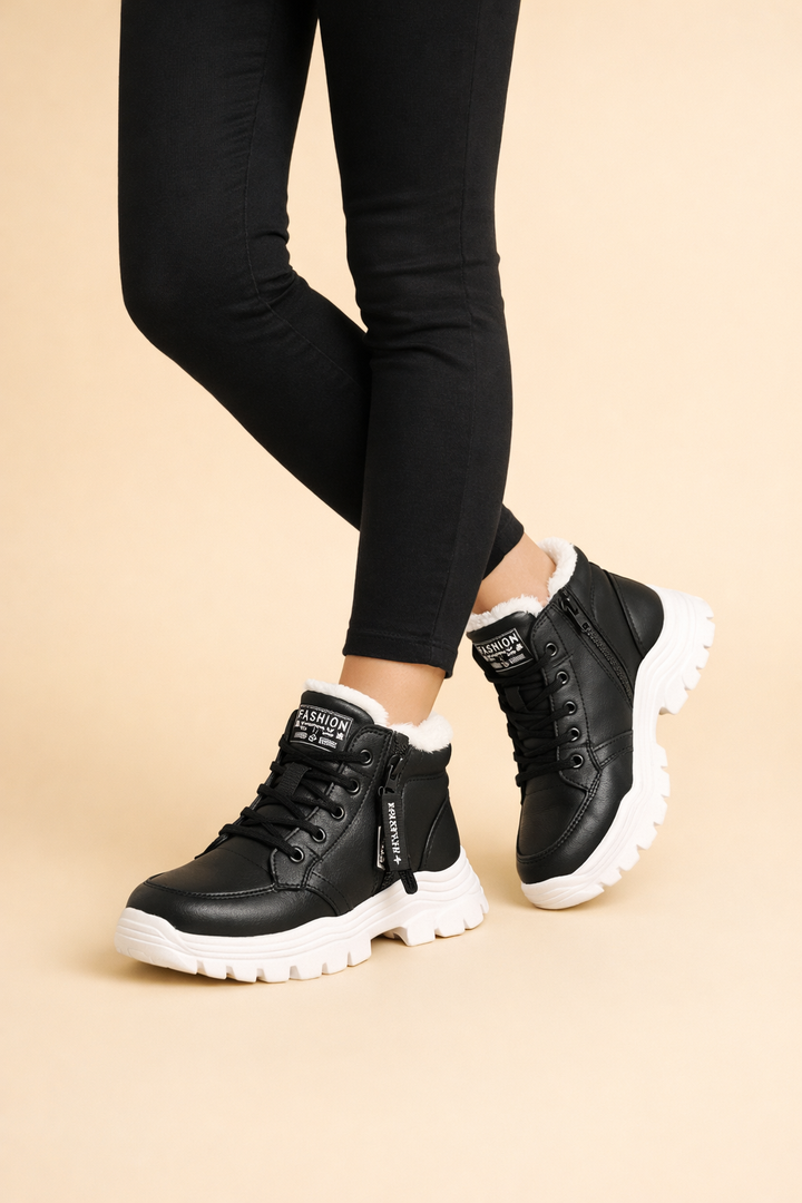 Durable women's waterproof winter snow boots. Warm, comfortable footwear designed for cold weather outdoor activities.