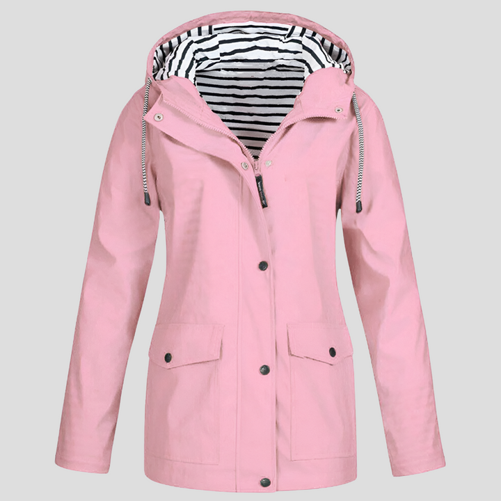Durable women's hooded jacket. Water & wind-resistant, perfect for active outdoor lifestyles in spring/fall.