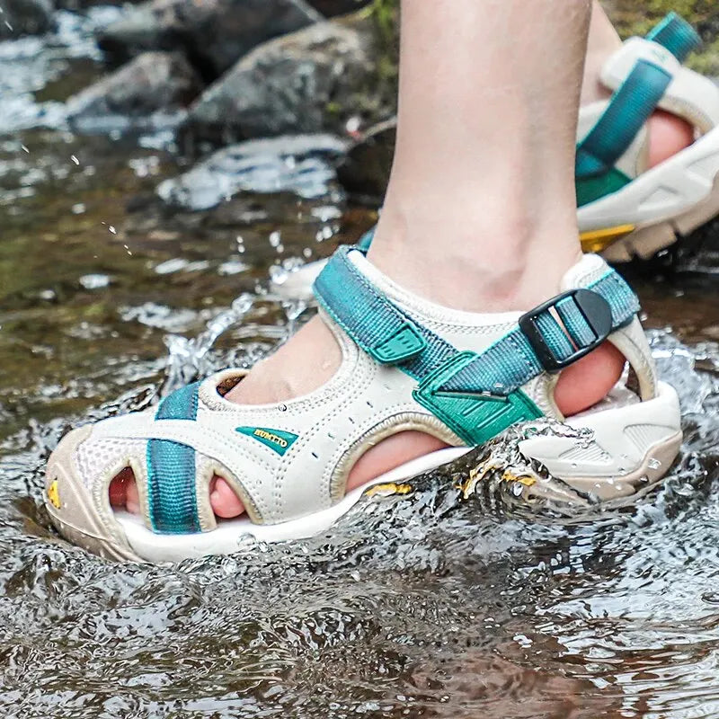 Athletic women's water sandals featuring arch support & non-slip grip, perfect for beach, water sports & trails.