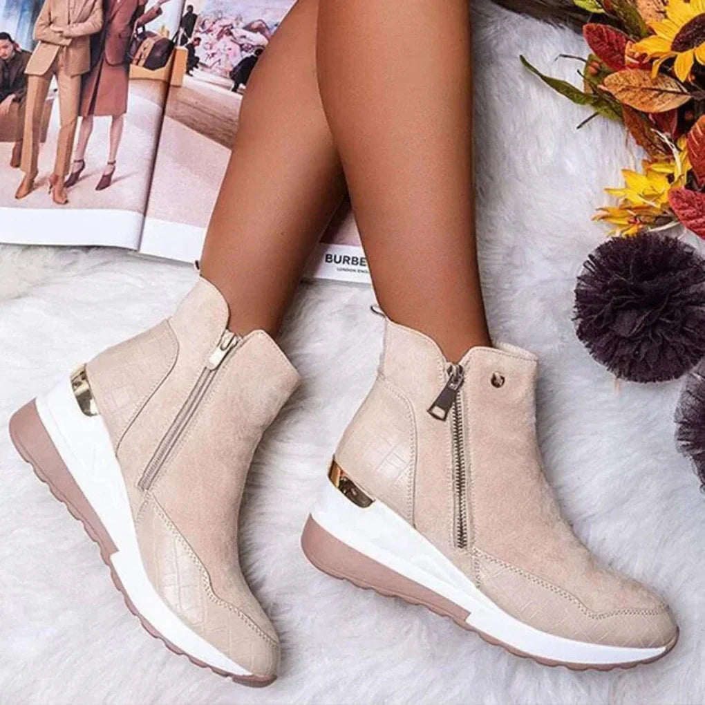 Stylish women's waterproof ankle boots, perfect for casual everyday wear in rain or winter, with comfortable fit.