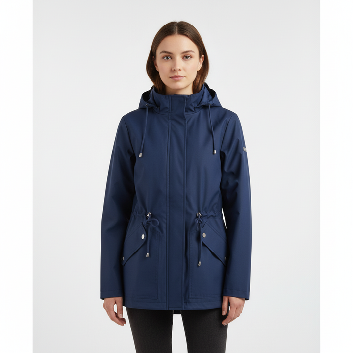 Lightweight women's utility style hooded rain jacket with a flattering drawstring waist, ideal for travel.