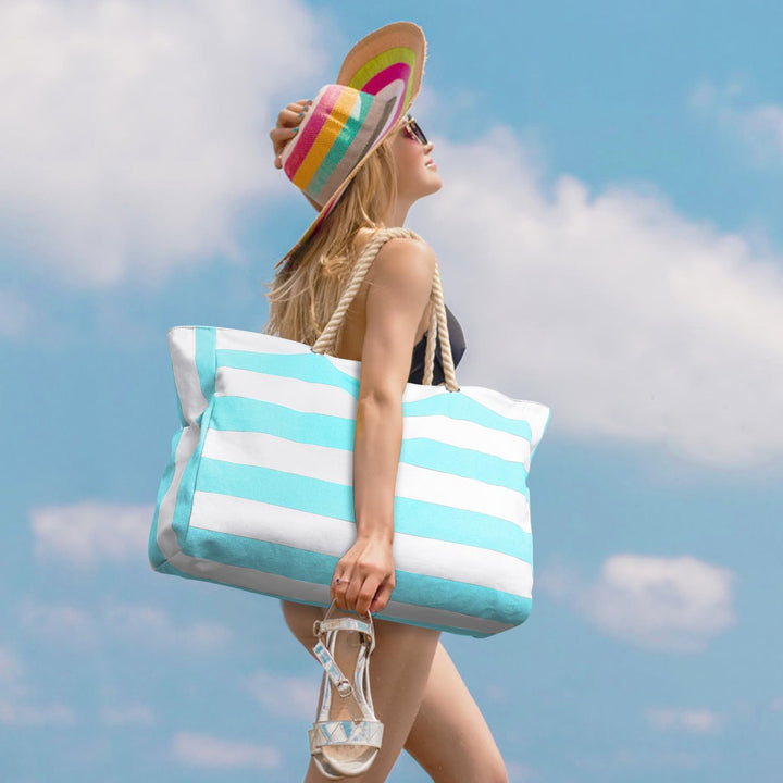 Family-friendly women's large waterproof beach bag, secure zipped storage for everyone.