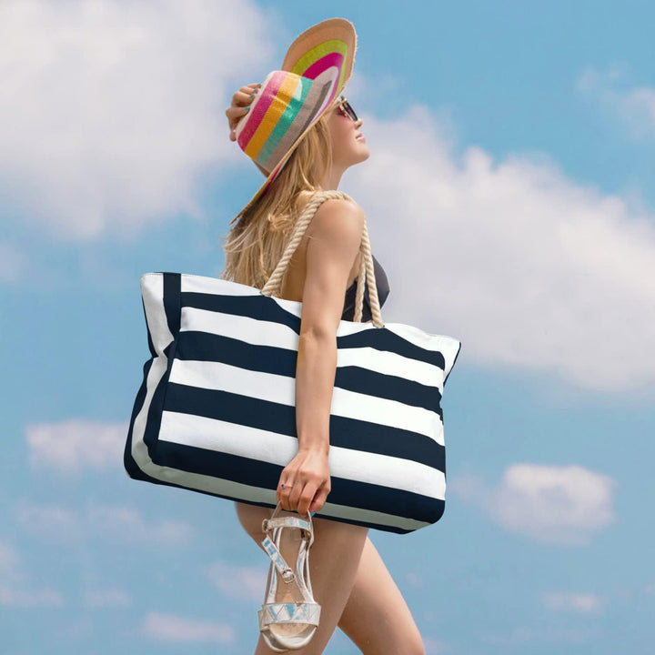 Streamlined women's waterproof large utility tote, efficient with zipped pockets.